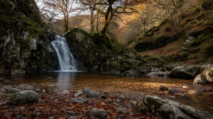 Autumnal waterfall cascading down mossy rocks into a tranquil pool, bathed in golden sunlight.