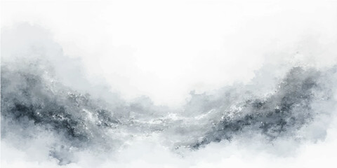 Cloudy winter mountain landscape with a deep blue sky over a misty fog