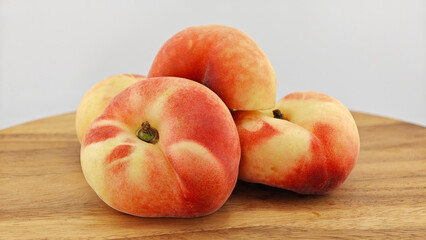 Chinese flat donut peach fruit.