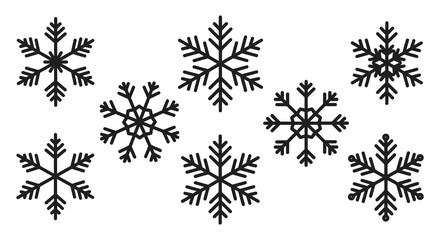 Black snowflakes on a white background in a random pattern