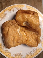 Tahu Goreng or Fried Tofu, Indonesia traditional food, made from fermented soybean extract.