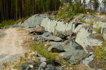 Beautiful and Scenic Quarry Landscape Featuring Lush Green Vegetation Alongside Rocky Terrain