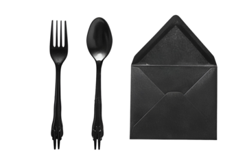 Black cutlery and envelope minimalist still life