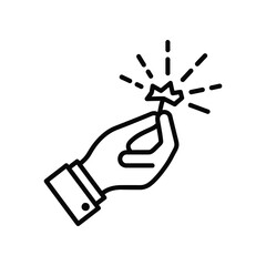 Sparkler Celebration in Hand: A hand elegantly holds a lit sparkler, its radiant sparks illuminating the night, symbolizing joy, celebration, and the magic of special occasions.