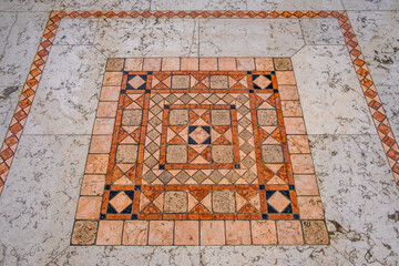Mosaic floors with a close-up pattern.