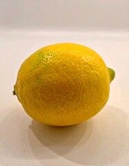 Single Lemon on White Background