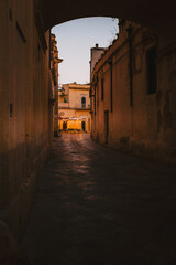 Narrow street in Nardò old town with warm atmosphere