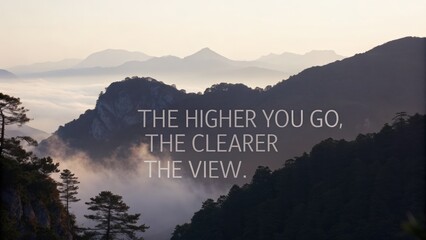 Serene mountain landscape with mist and inspirational quote