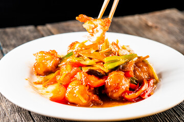 Fried shrimp in sweet and sour sauce with vegetables.Asian food. Chinese cuisine