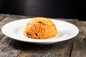 White rice with shrimp on a dark background.Asian food. Chinese cuisine