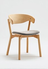 Light wood chair with upholstered seat.  Simple, modern design with a curved back and seat.  Natural wood legs support a grey fabric seat.  Clean lines and minimalist aesthetic