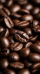 Obraz premium Macro close-up of dark roasted coffee beans showcasing rich brown color and glossy texture