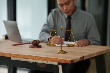 lawyers or attorneys discussing a contract agreement. Successful businessmen have a contract in place to protect it,signing of modest agreements form in office.