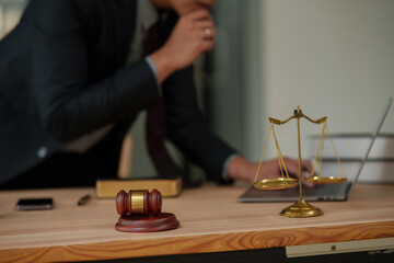 lawyers or attorneys discussing a contract agreement. Successful businessmen have a contract in place to protect it,signing of modest agreements form in office..	