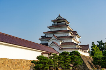 Facade of the Tsuruga Castle in the morning in Fukushima, Japan