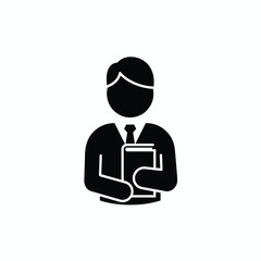 Obraz premium A man in a suit and tie holding a book, representing knowledge and education.