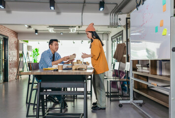 Startup Team Brainstorming Innovative Eco-Friendly Packaging Solutions