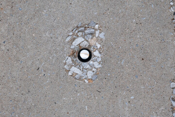 A hole in a concrete electrical pole