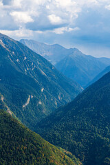 Fototapeta premium Rioumajou Valley Dominated by Lustou Peak from Pla d’Adet Ski Resort in Saint-Lary-Soulan in Summer