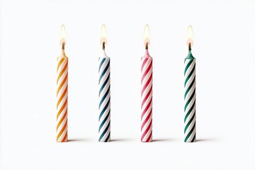 Four birthday candles, orange, teal, pink, and green, with white stripes, lit, on a white background