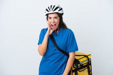 Young delivery woman with thermal backpack isolated on white background with surprise and shocked facial expression