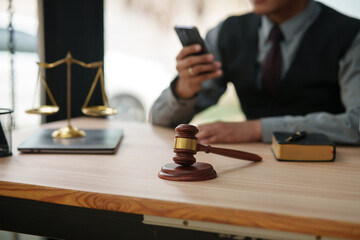 lawyers or attorneys discussing a contract agreement. Successful businessmen have a contract in place to protect it,signing of modest agreements form in office..	