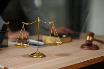 lawyers or attorneys discussing a contract agreement. Successful businessmen have a contract in place to protect it,signing of modest agreements form in office..	