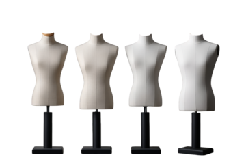 Five mannequin forms in a studio setting