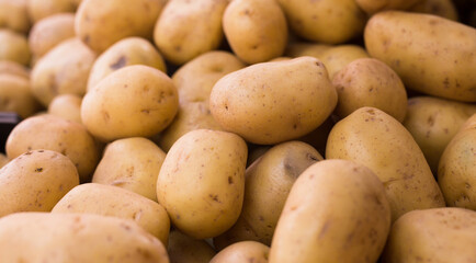 potatoes on counter in market