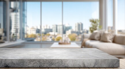 A light gray concrete countertop or tabletop in front of a blurred view of a modern living room with city views