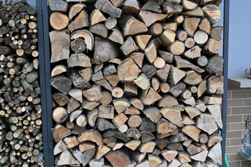 Drying wood in stands from iron for winter heating