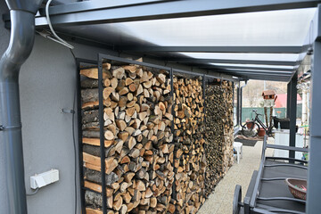 Drying wood in stands from iron for winter heating