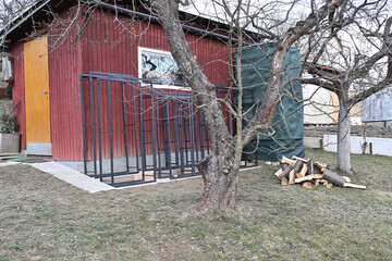 Iron decorative firewood stands for winter near house 