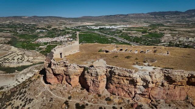 Drone view of the medieval Alcal&aacute; Castle on a hill in Mula, Murcia Region, Spain.