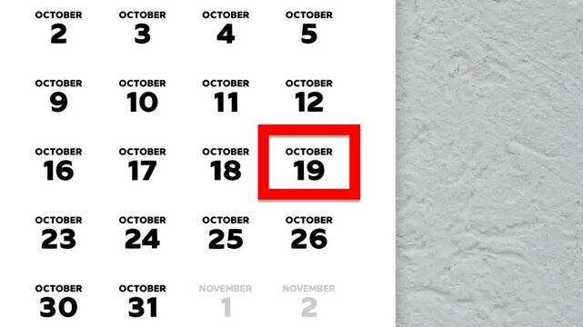 The date October 19th marked with a red cursor on the wall calendar 2025