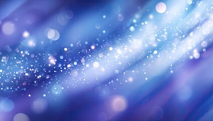 Abstract, vibrant, blurred background of  swirling,  blue and purple hues with sparkling bokeh