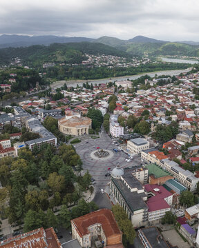 Aerial view of the vibrant city where the rich terracotta rooftops contrast with the lush green trees near the Tskaltubo Avenue, Kutaisi, Imereti, Georgia.