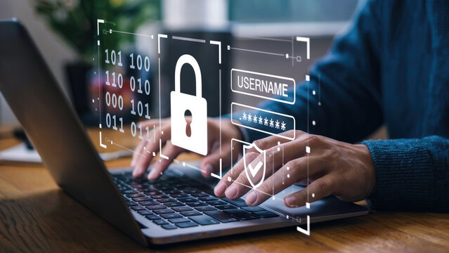 Hands typing on laptop with security lock, password, and data protection concept