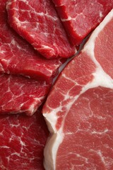 Fresh cuts of red meat filling the frame