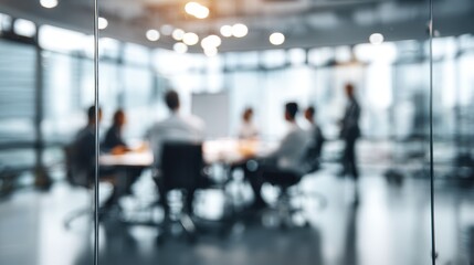Business meeting in modern office space with participants engaged in discussion