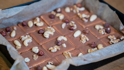 Homemade Chocolate Biscuit Cake with Mixed Nuts – Baking Close-up