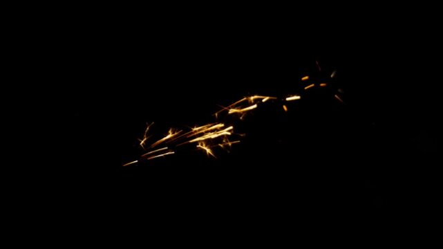 Realistic orange fire sparkle particle on black back ground. 
