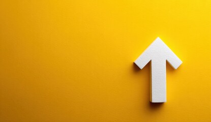 White Arrow Pointing Up on Bright Yellow Background for Direction or Growth Concept