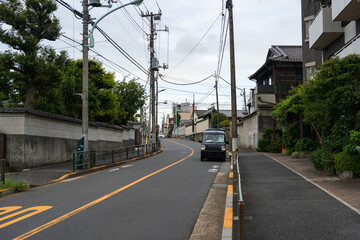 Residential Side Street in Tokyo with Power Lines