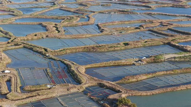Aerial view of the salt fields of Guerande France at sunset