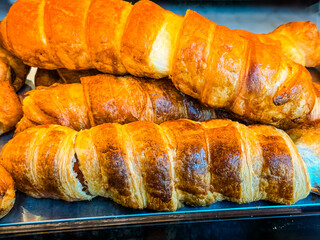 Fresh croissants with golden flaky crust. French bakery, breakfast and pastry indulgence.