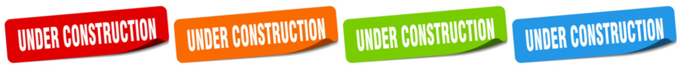 under construction sticker. under construction sticker set on white background