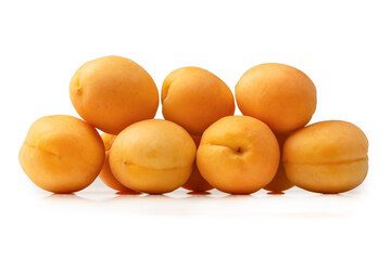 Ripe juicy orange apricots isolated on white background.