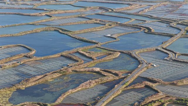 Aerial view of the salt fields of Guerande France at sunset