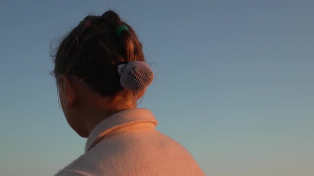 Girl, looking, sky, young girl looking at the sky at sunset with warm light